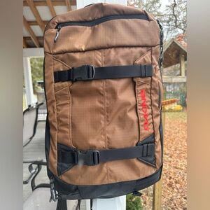 Dakine Mission Pro 25L Backpack in the color brown (rubber).